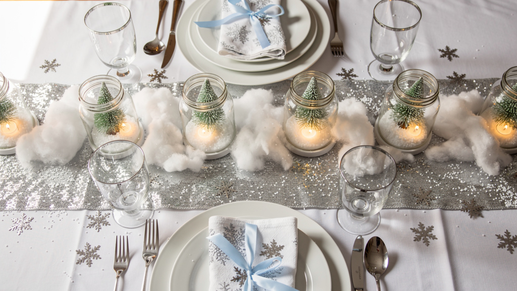 Elegant winter party tablescape with white and silver