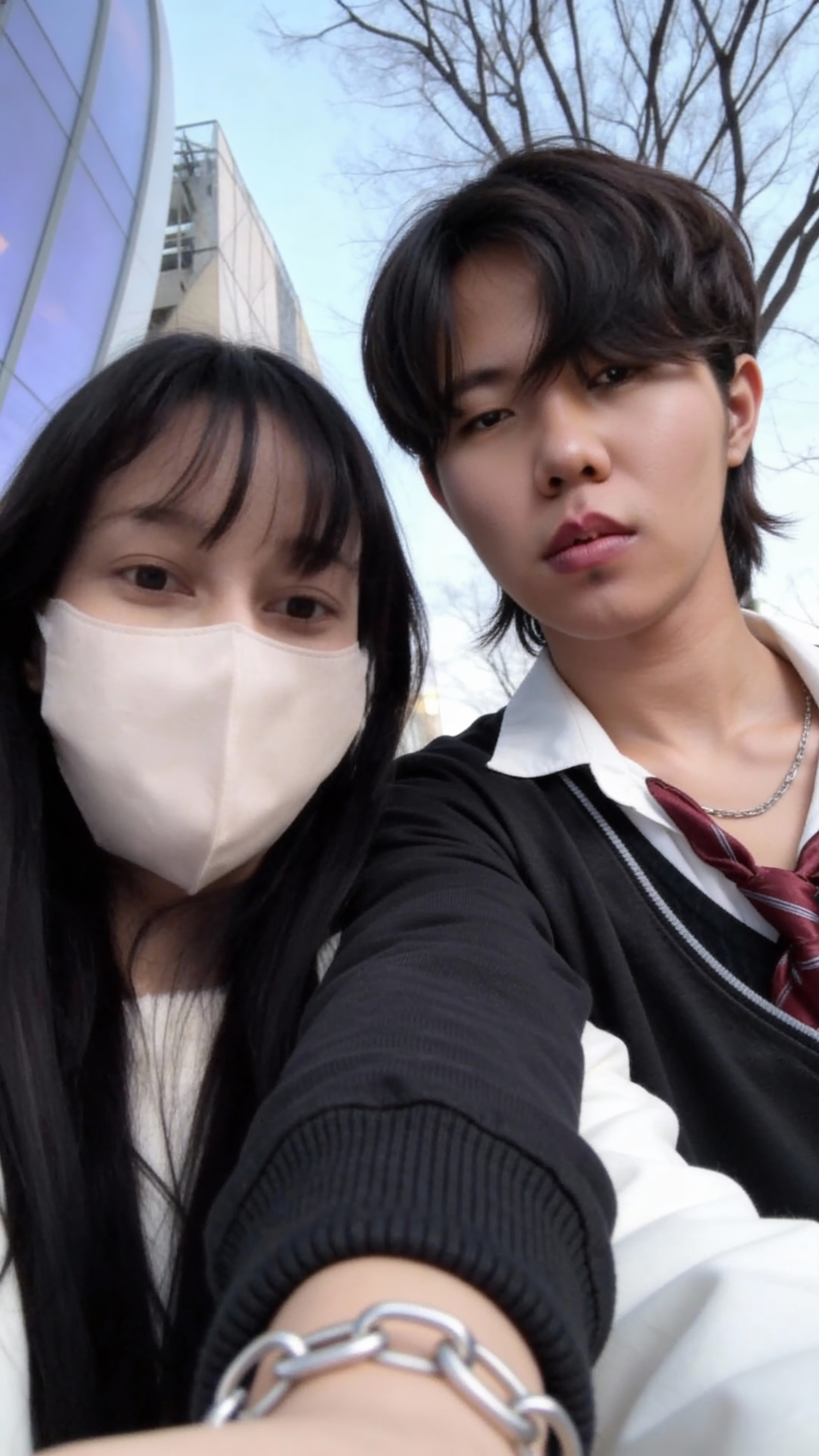 add-the-man-next-to-the-woman-taking-a-selfie-n2ev86quny