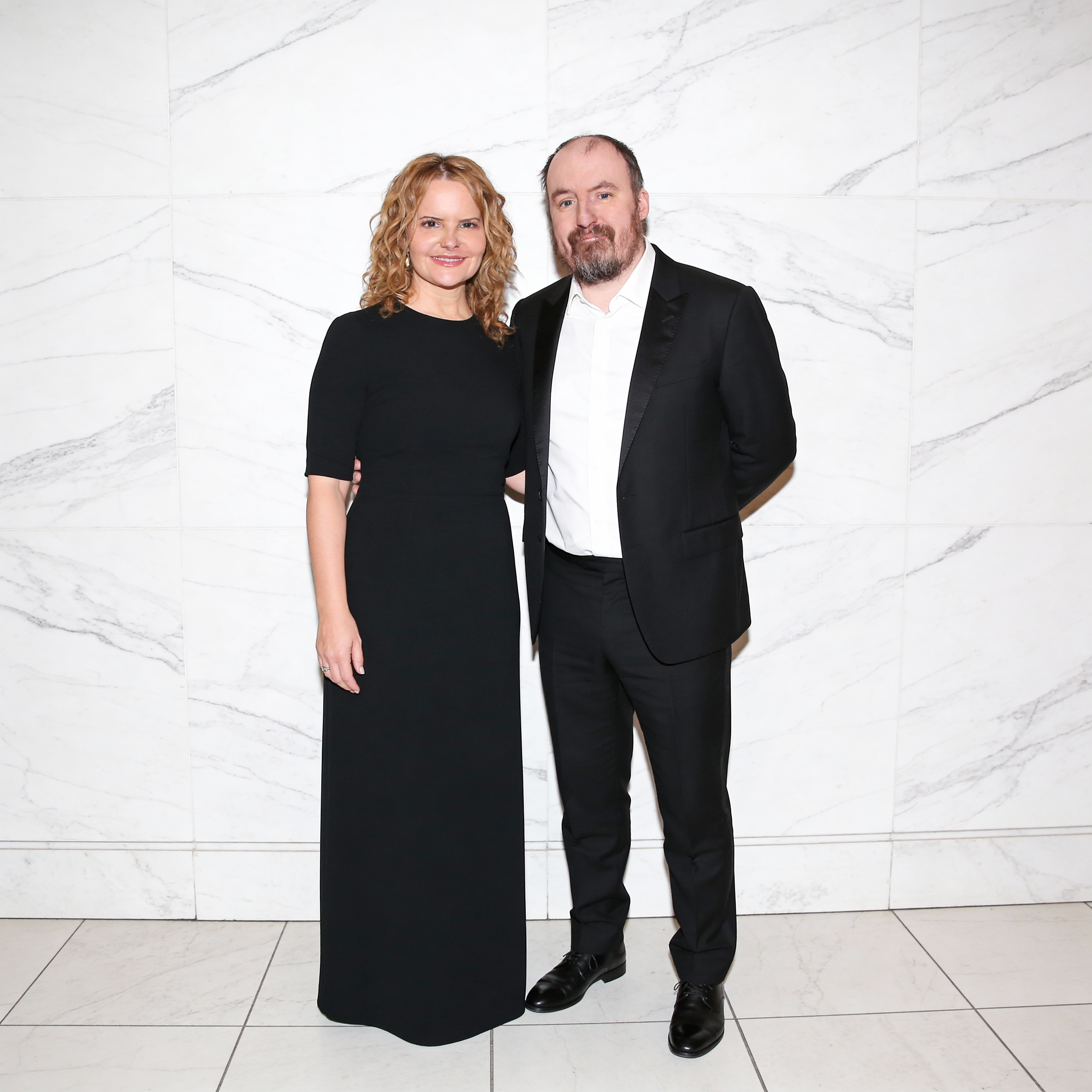 woman-is-wearing-a-black-dress-man-is-wearing-dzzfijo7rs