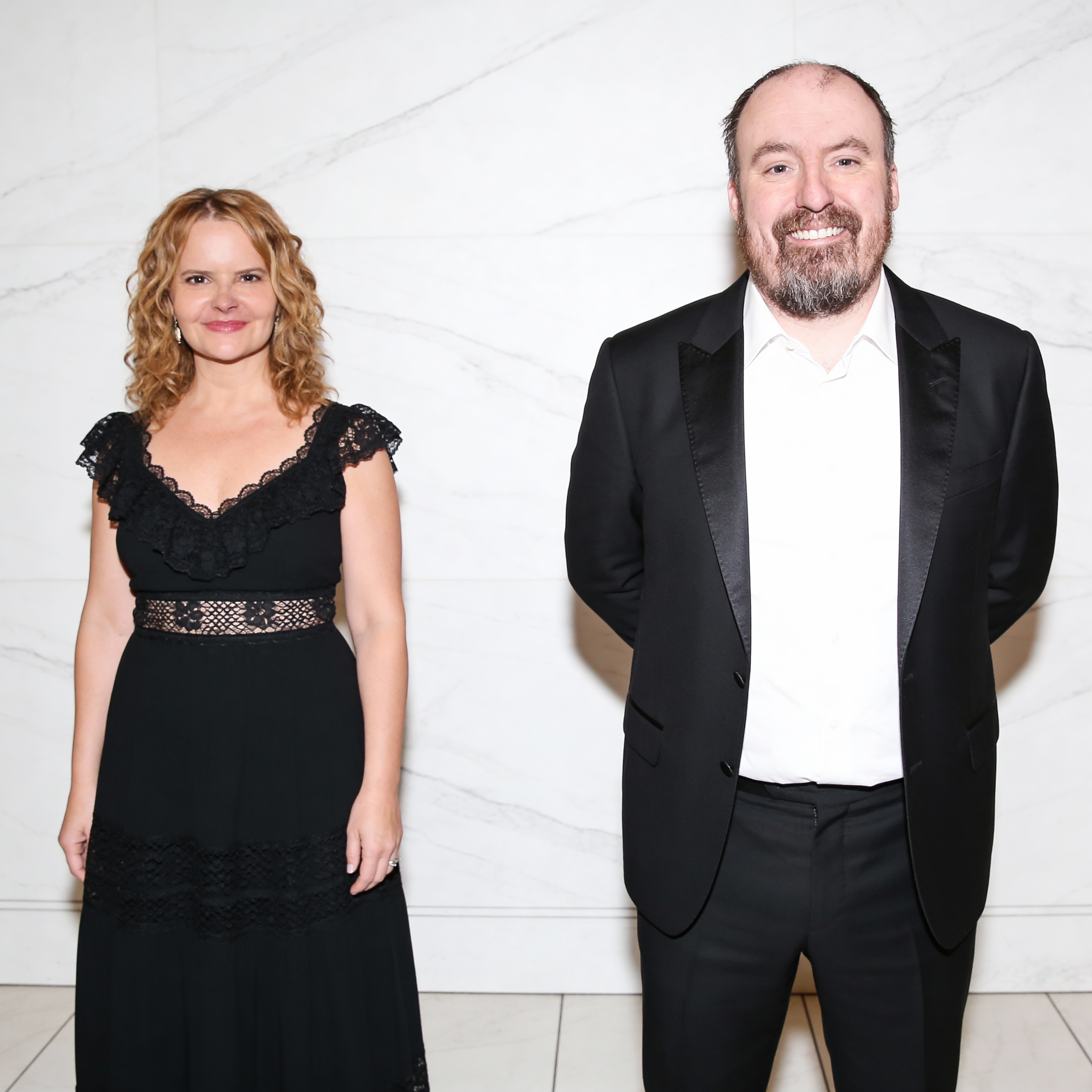 woman-is-wearing-a-black-dress-with-lace-and-the-k061xxza7v