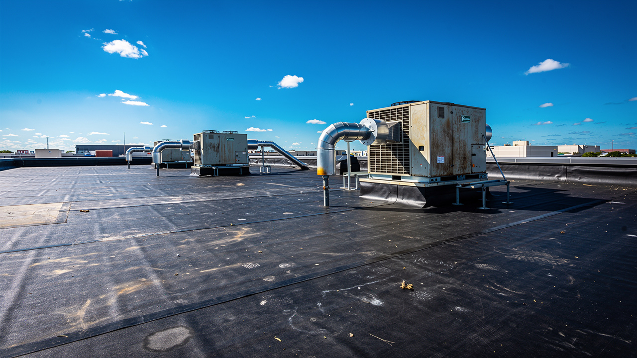 EPDM rubber roofing membrane on commercial building under sun