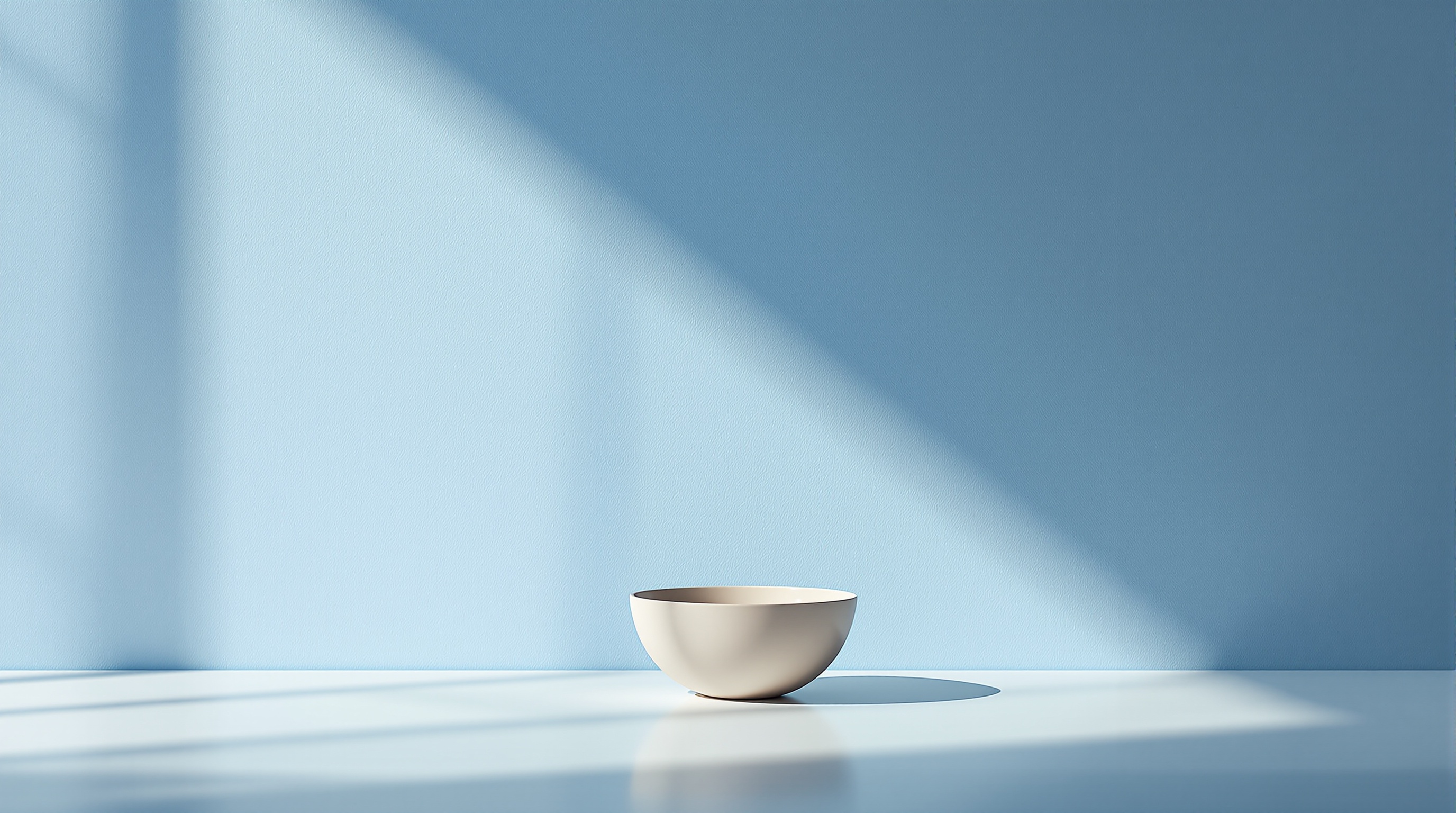 small-handmade-clay-bowl-centered-on-powder-blue-vata9ockek-2