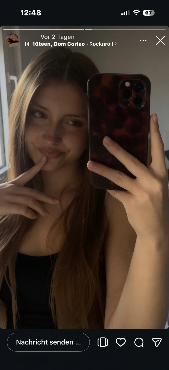 she-with-nike-pro-shorts-and-a-black-bra-gk2x1em871