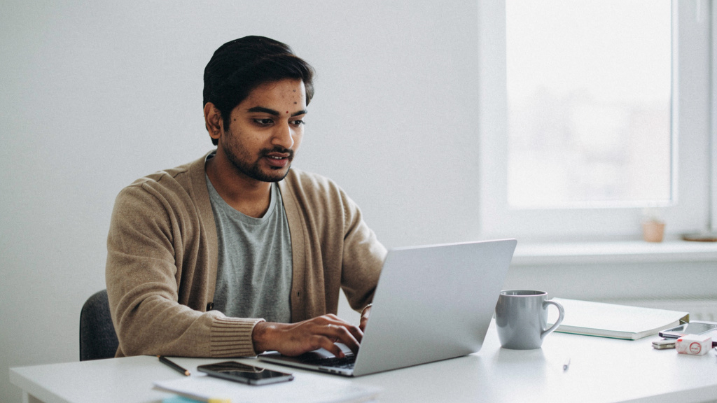 content creator at home office working on 12 ways ai can help you make money online today