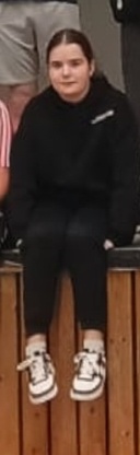 a-portrait-of-a-young-woman-with-natural-lighting-9rpsme878s