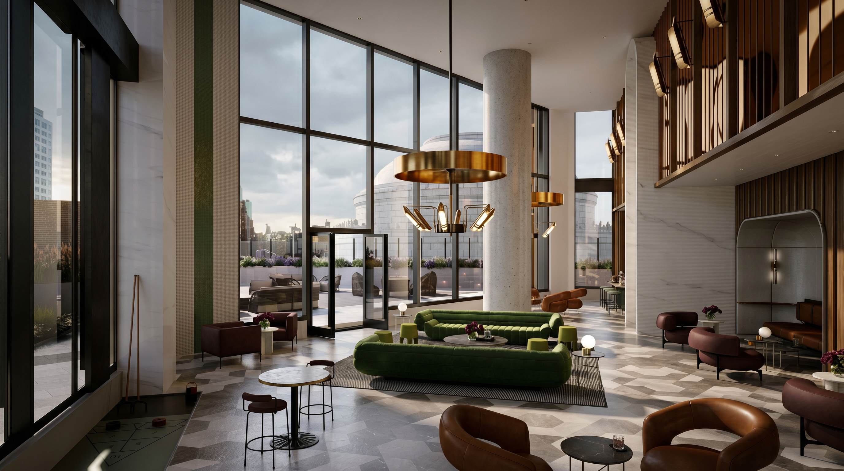 This expansive, high-ceilinged lobby or lounge area exudes modern luxury with its floor-to-ceiling windows, polished geometric tile flooring, and sophisticated green velvet seating. The space is anchored by a striking gold chandelier and features a seamless transition to an outdoor terrace, creating an airy and inviting atmosphere. The design blends contemporary architectural elements with warm, upscale furnishings, perfect for a high-end residential or hotel amenity space.