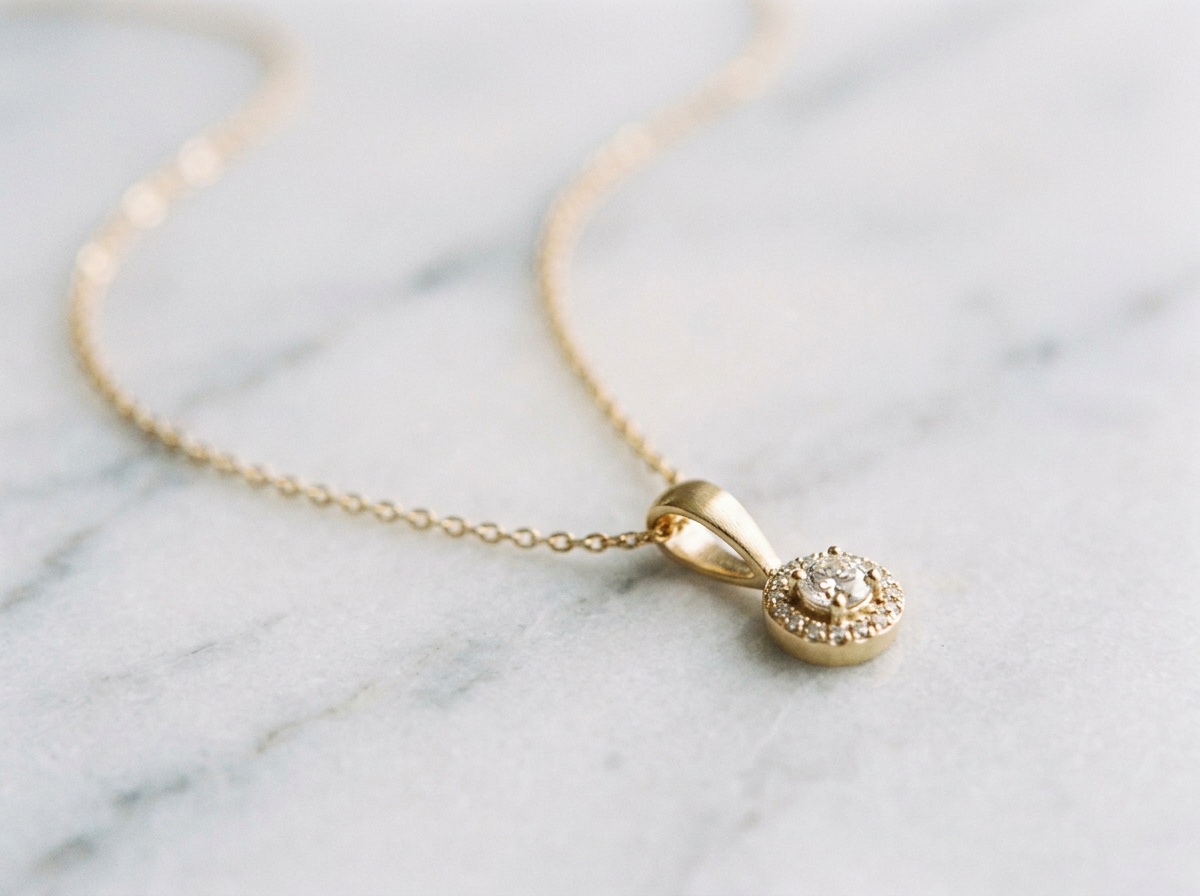 Macro shot of a delicate piece of jewelry on a textured surface