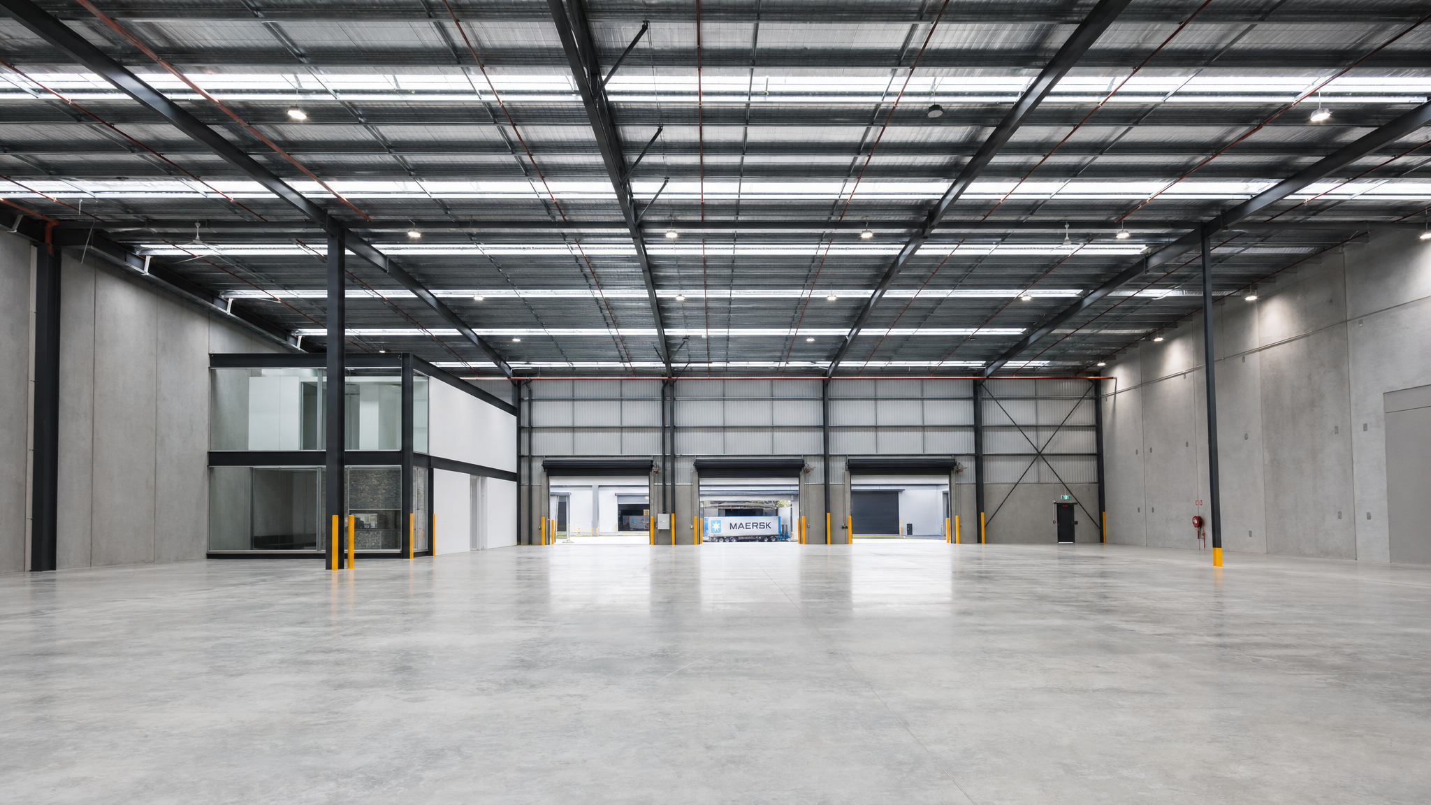 High-bay warehouse interior with clear span structure