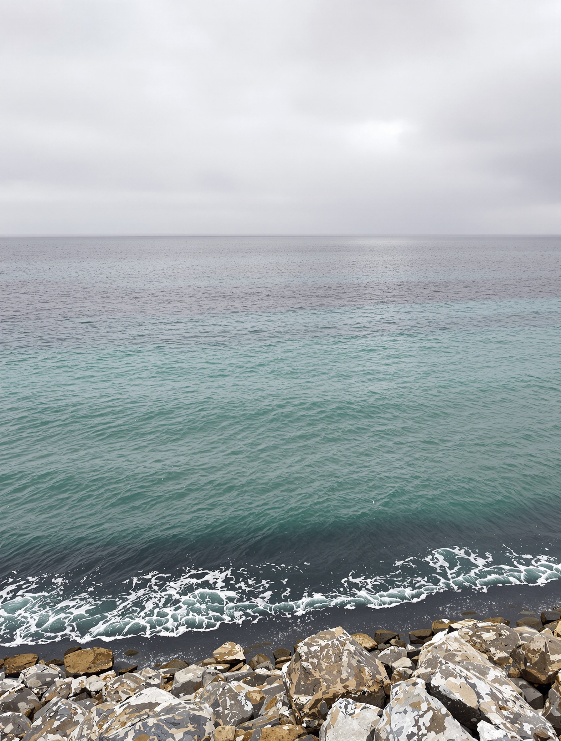 A wide overcast Adriatic seascape evoking the elemental scale of Megamare by Orto Parisi.