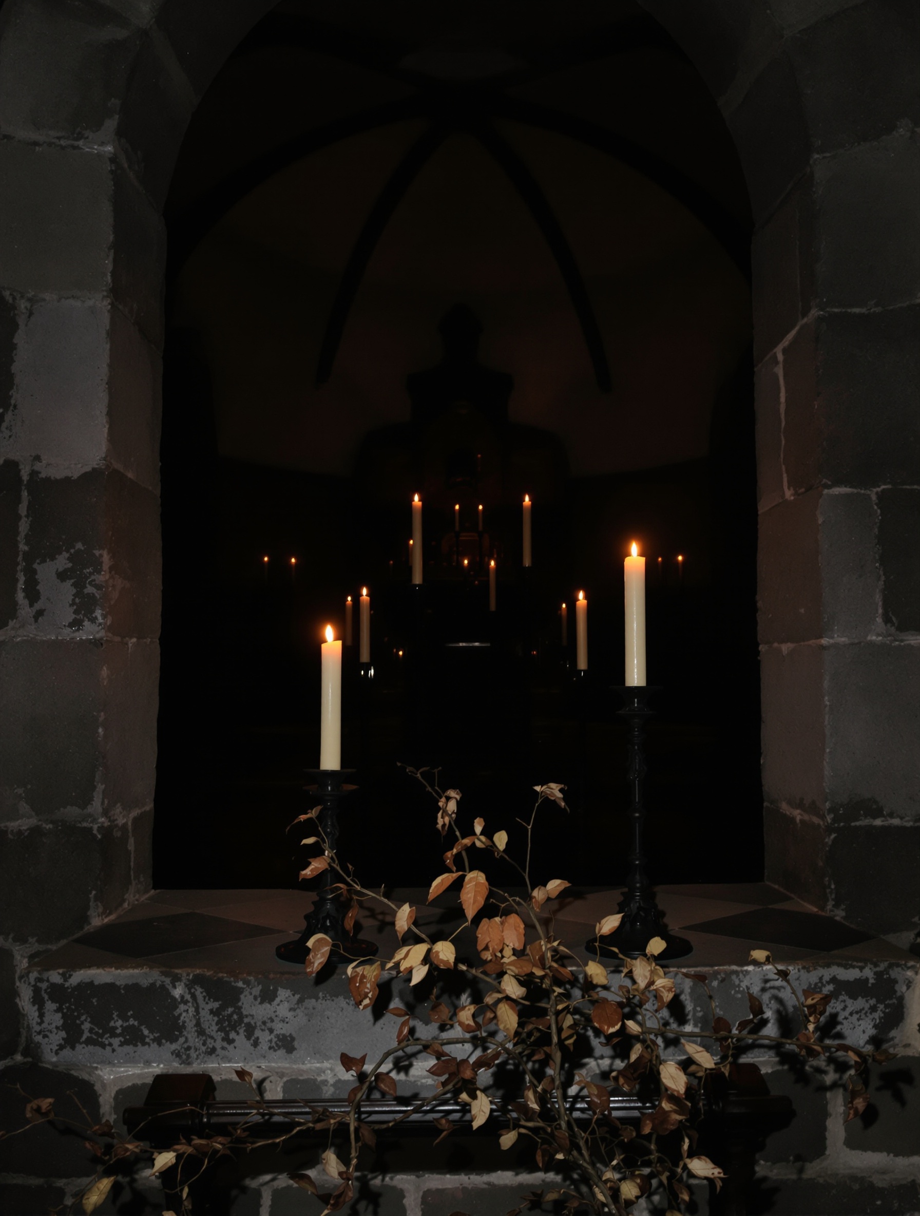 A dim Romanian Orthodox church interior at vespers for Judgment Day by Adi Ale Van, candles guttering on iron stands, oak branch across a stone threshold.