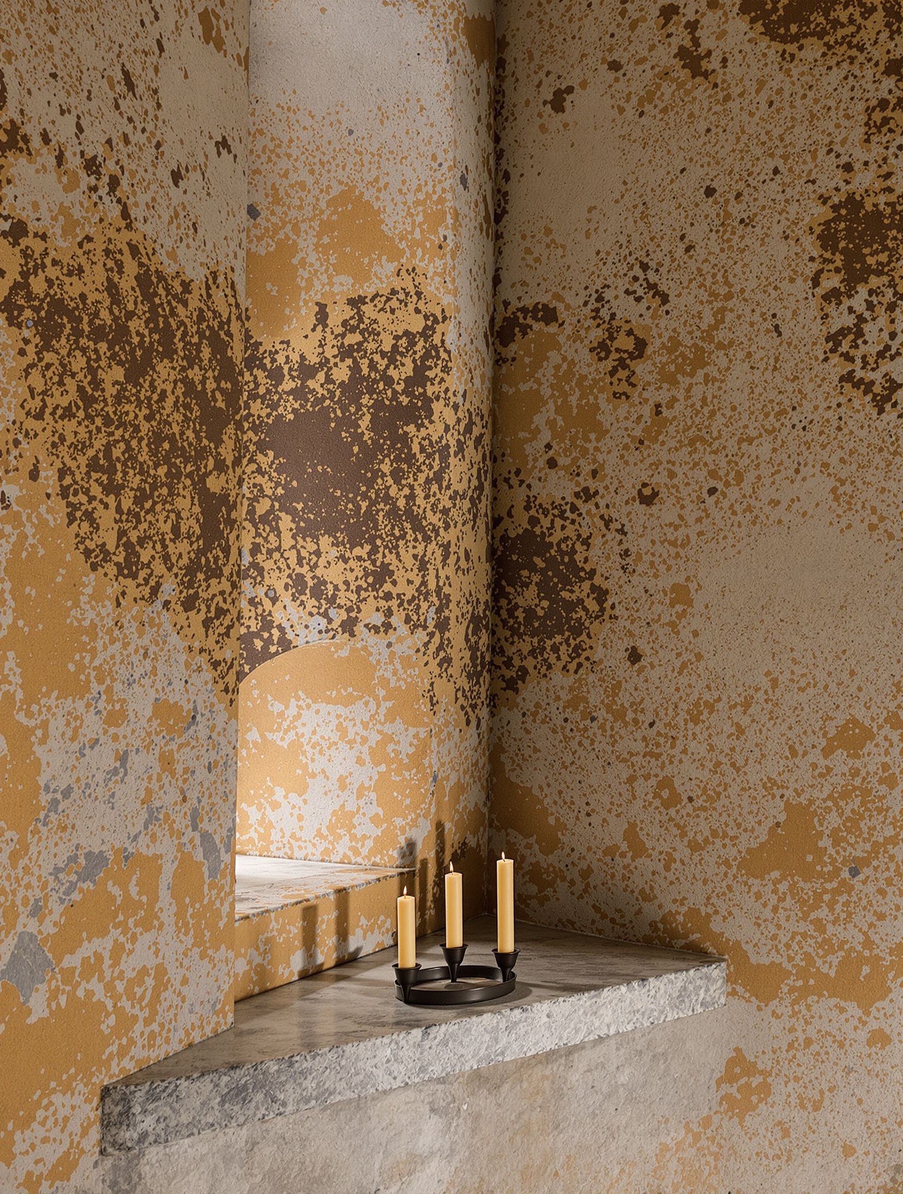 A bare limestone monastic cell with incense-stained walls and spent beeswax candles on a stone ledge, capturing the austere sacred stillness of Diamonitirion Elixir Atonit.