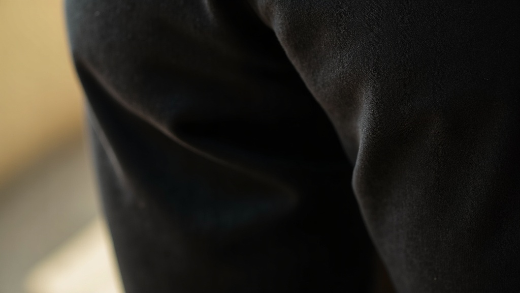 Textura de tela de pantalón negro mujer de calidad