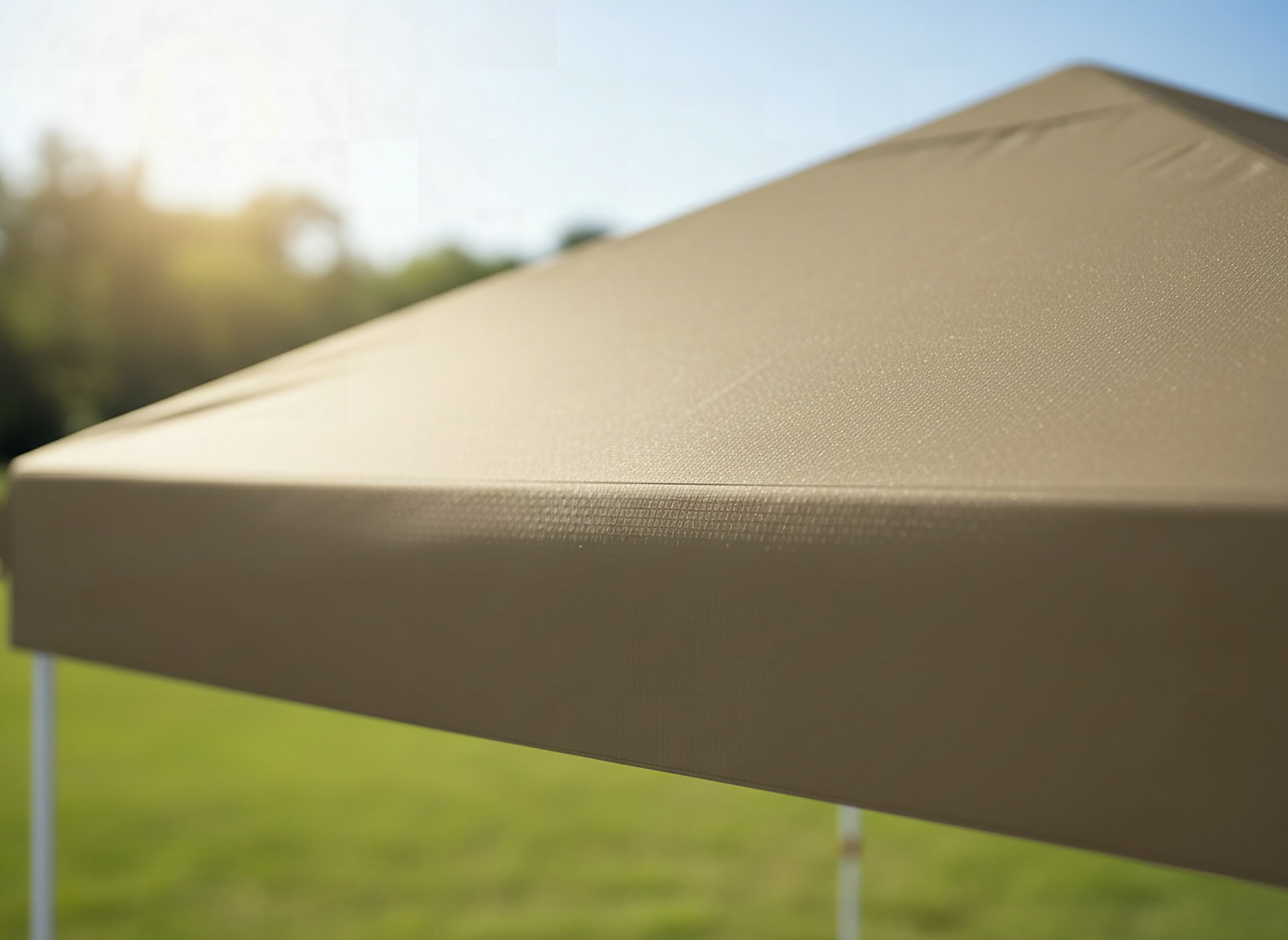 Macro detail of Garvee pop-up canopy fabric weave showing waterproof coating texture in bright sunlight