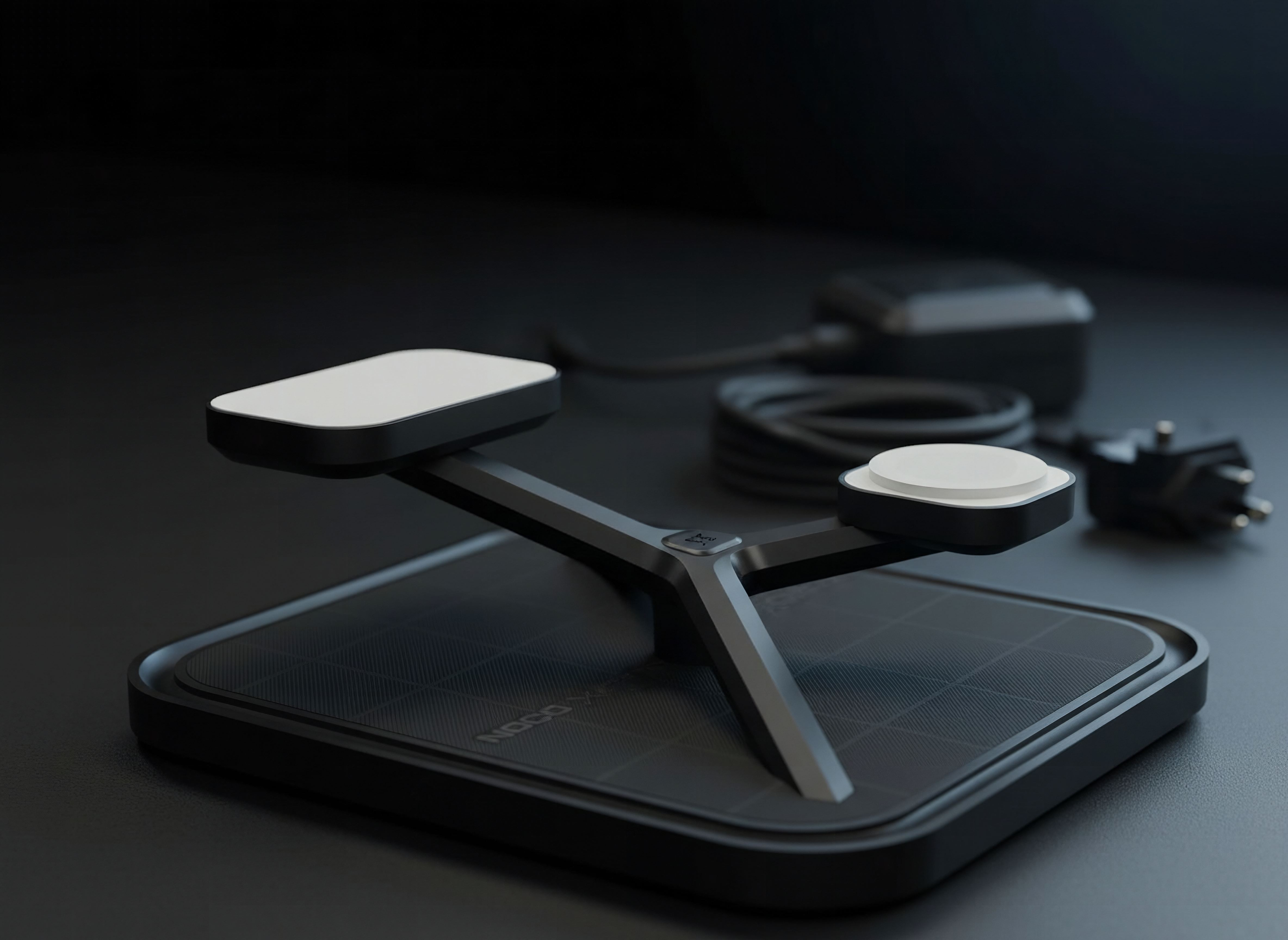 NOCO XGrid XDS3 macro detail showing magnetic alignment rings and wireless charging coils in sharp focus