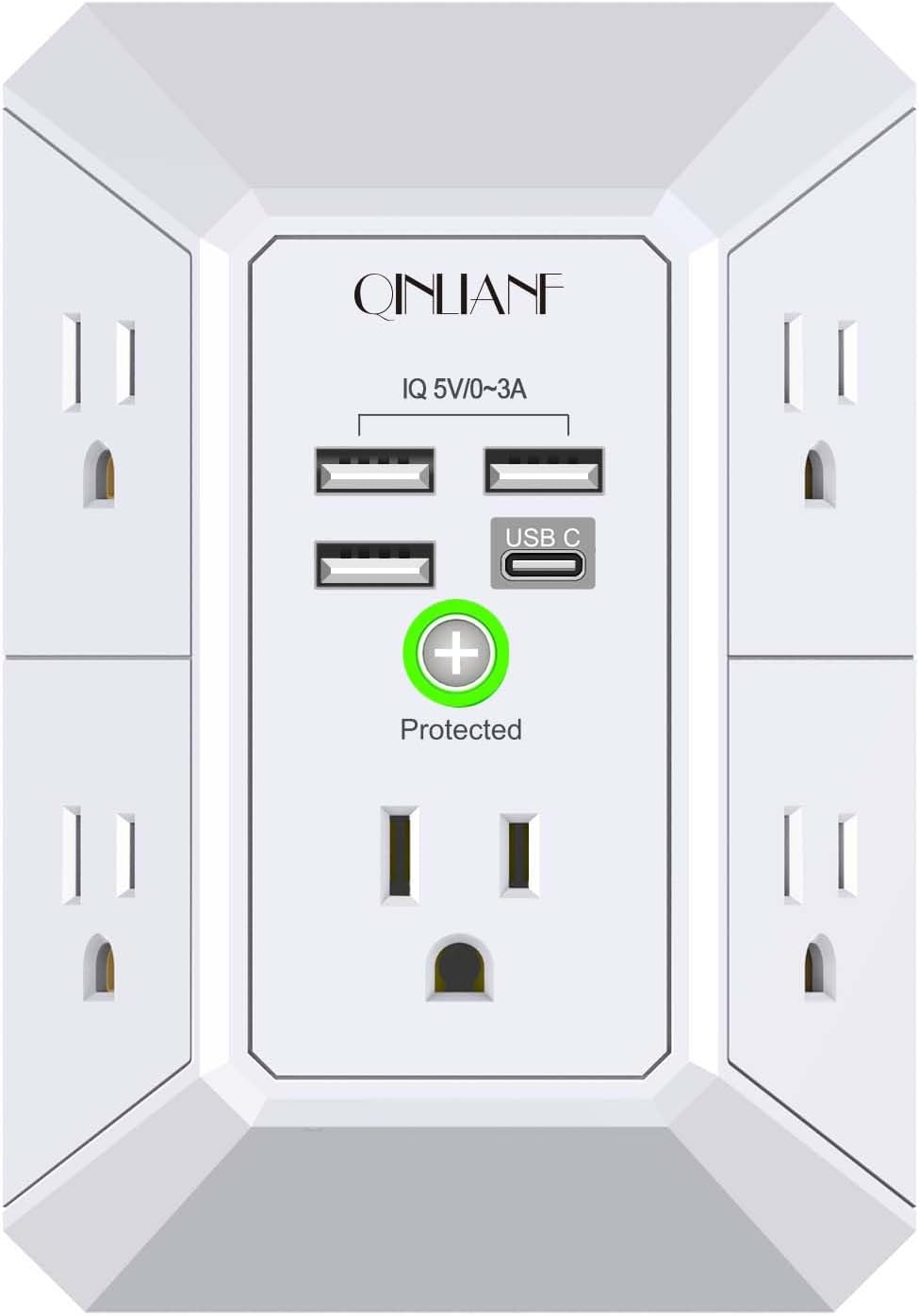 QINLIANF surge protector on a cluttered home office desk with multiple devices and cables