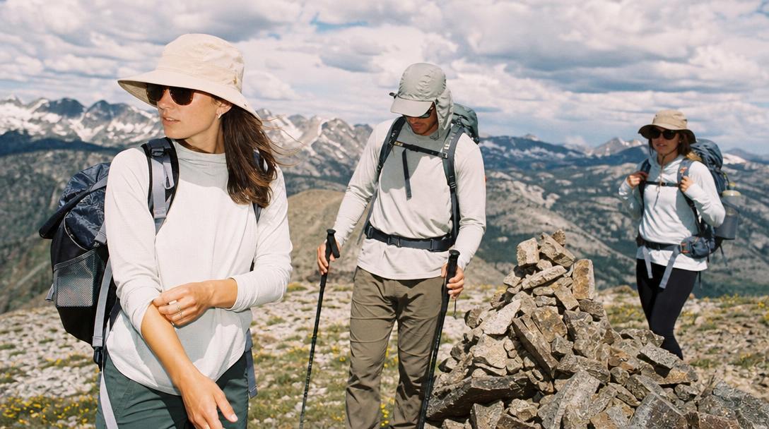 Hiker wearing short sleeve shirt on shaded trail