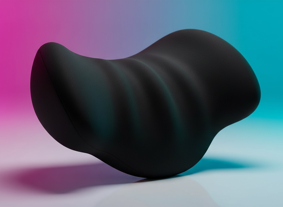 Close-up detail of black memory foam car neck pillow showing ergonomic contours and fabric texture