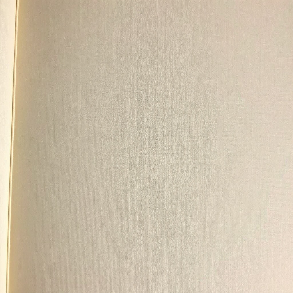 The printers' device on the back board: a lozenge of overlapping rollers, worn smooth on the right-hand side where a thumb has gone.