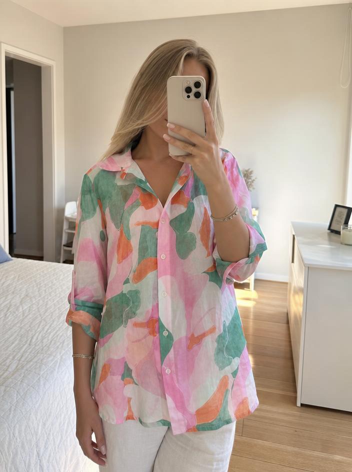 Abstract floral print sheer button-up blouse — Vinted listing photo example