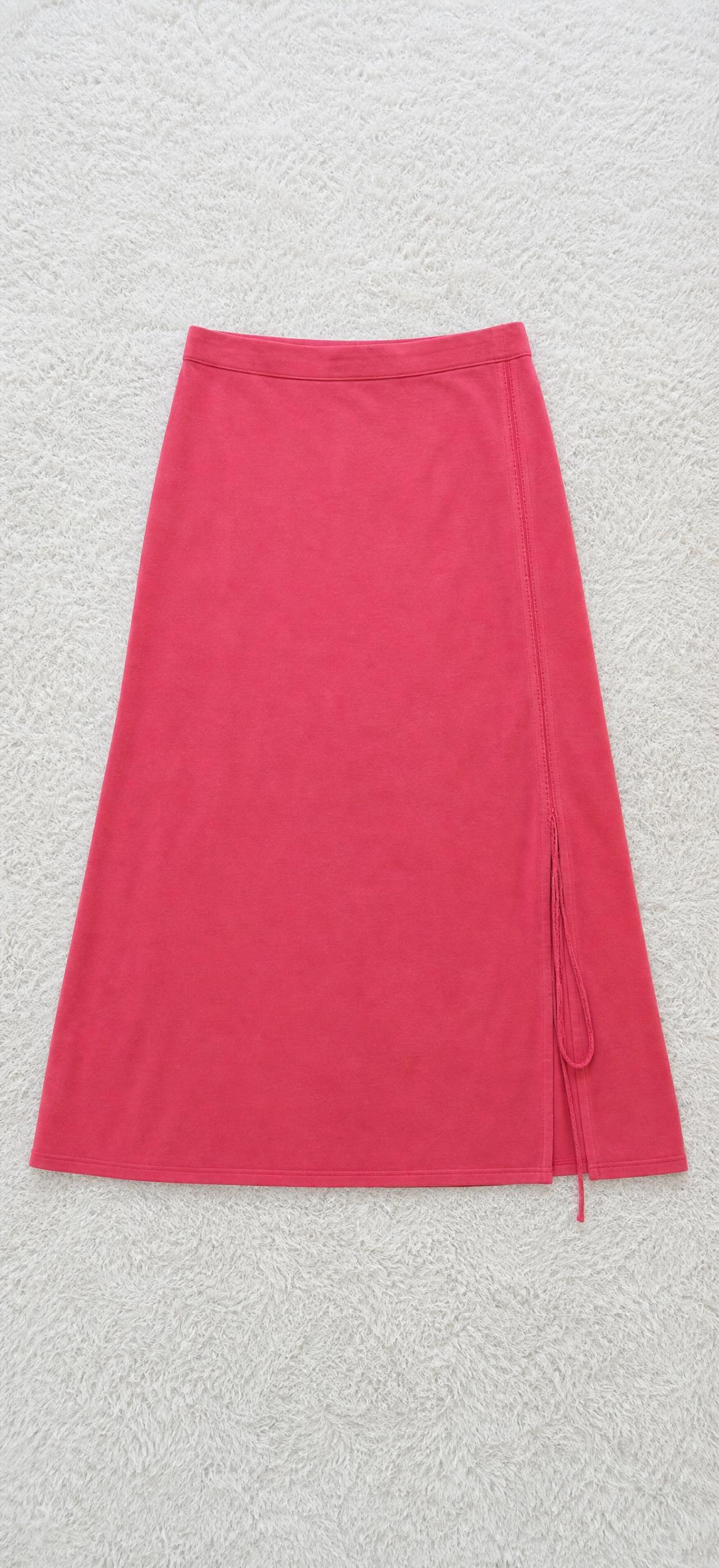 Pink cargo mini skirt with pockets and drawstring detail — Vinted listing photo example