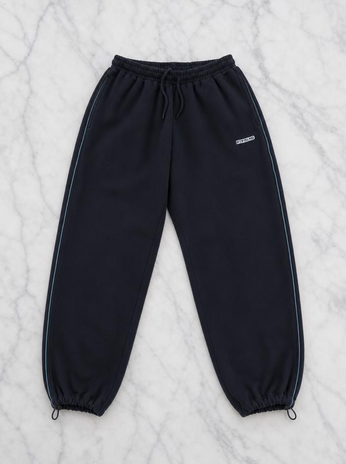 Jetstreams black track pants with blue piping, very good