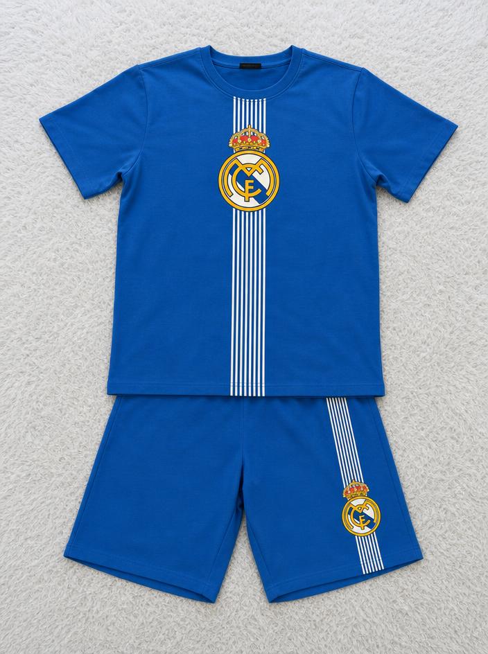 Real Madrid blue football shirt with crest and stripe detail