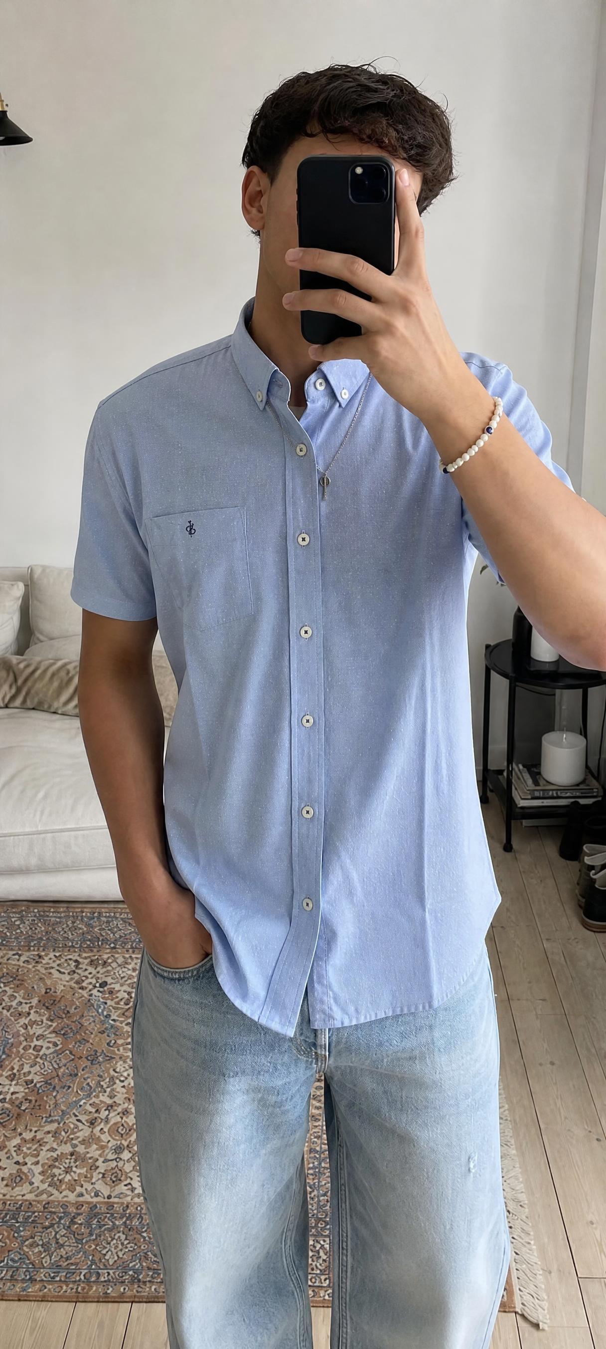 Men’s light blue checked button-up shirt with chest pocket