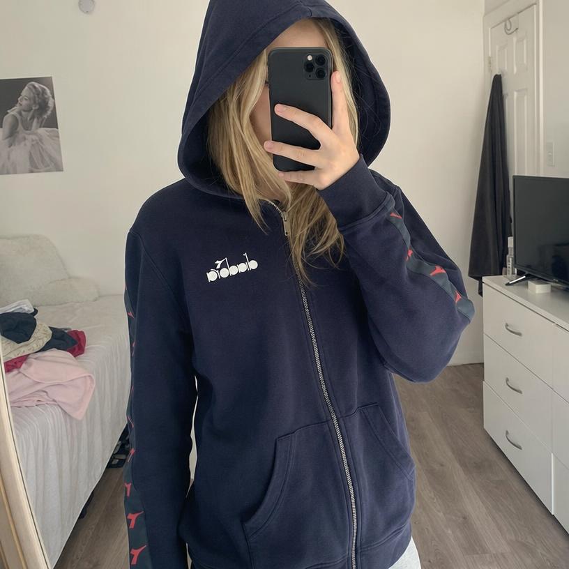 Diadora black hooded track jacket with red sleeve detail
