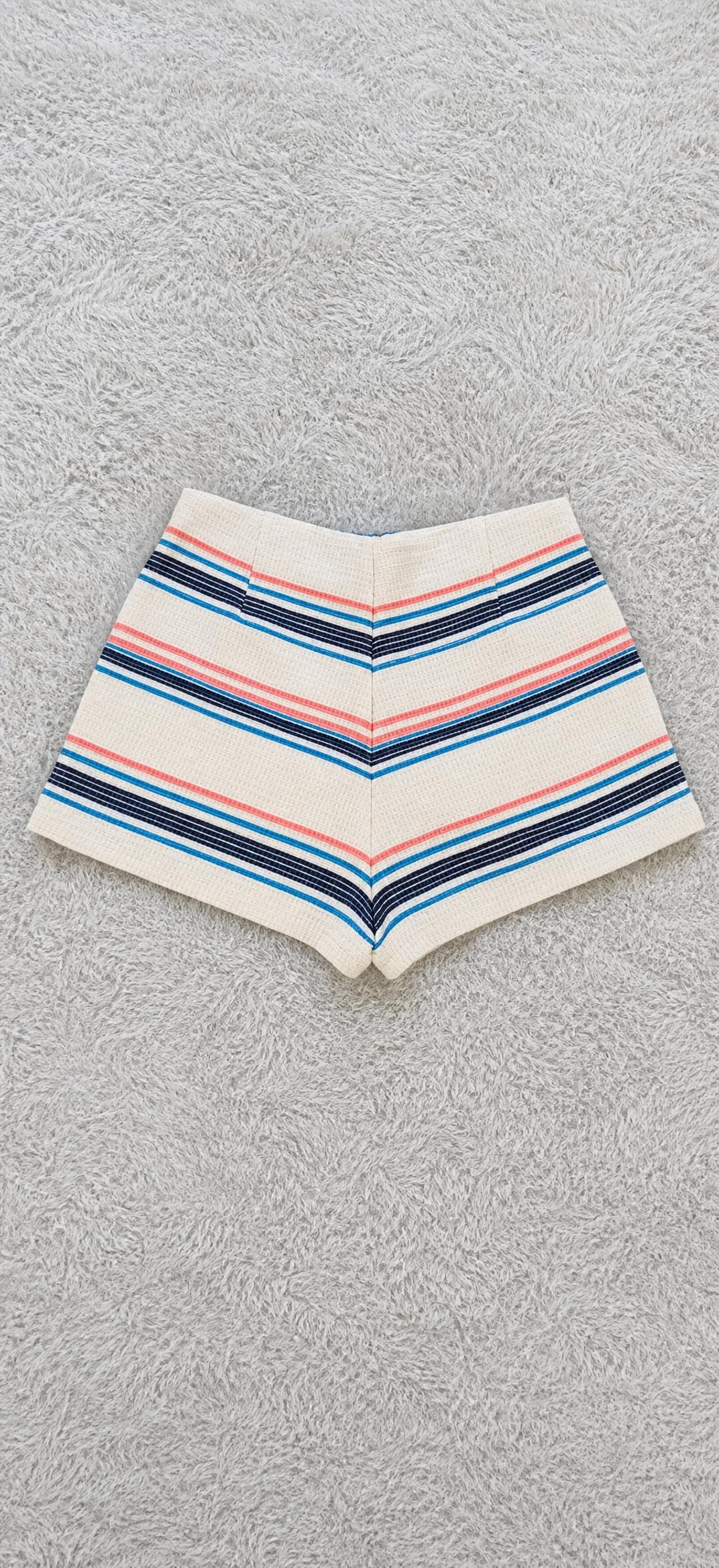 Striped high-waisted tailored shorts in cream