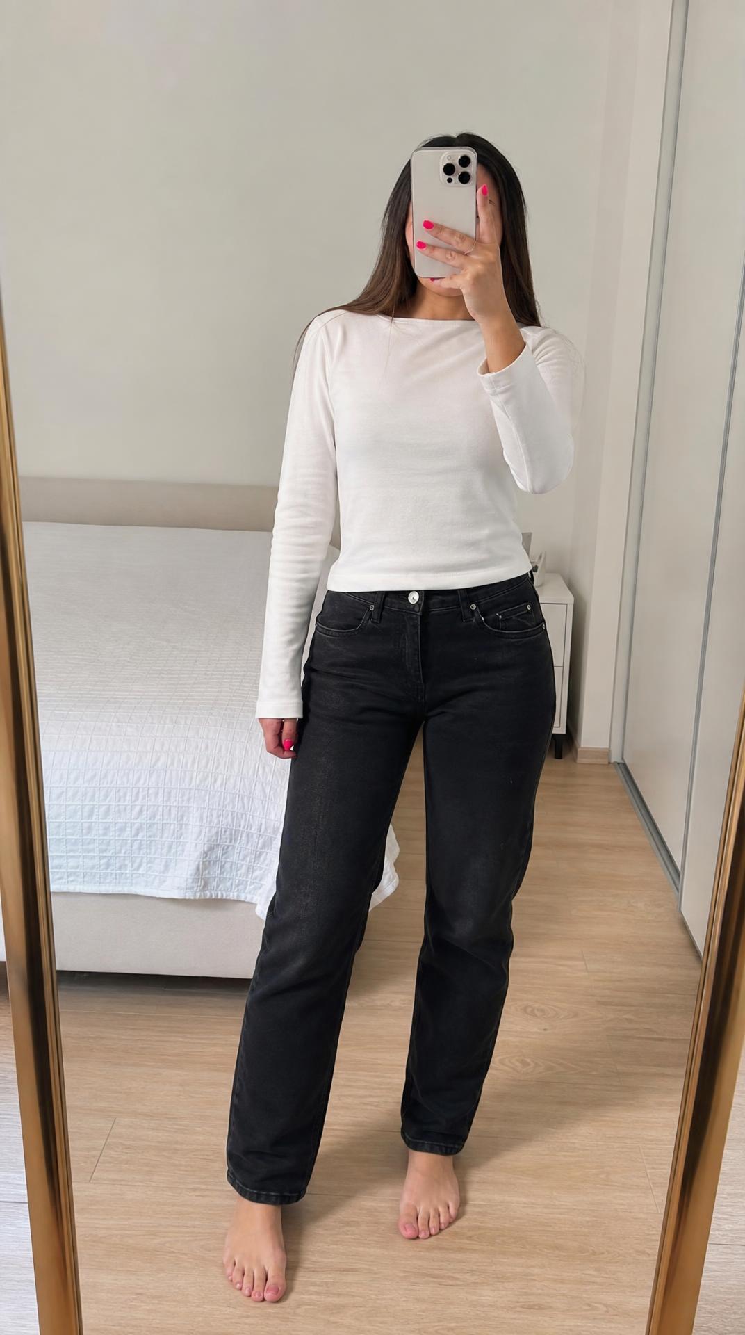 Black straight-leg jeans size 28 with faded finish