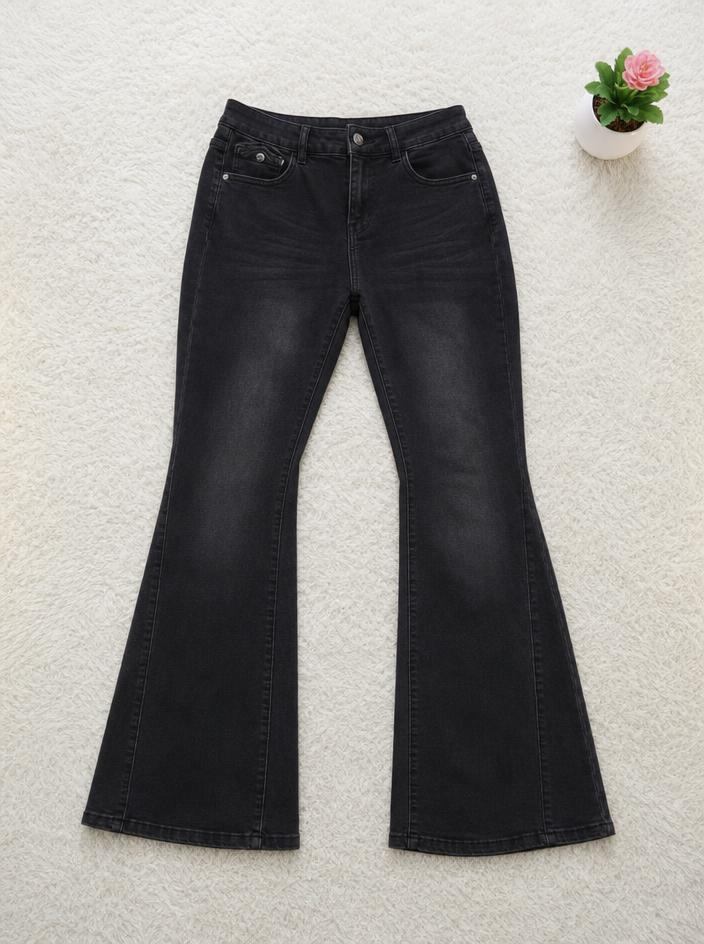 Black skinny jeans with five pockets and faded finish