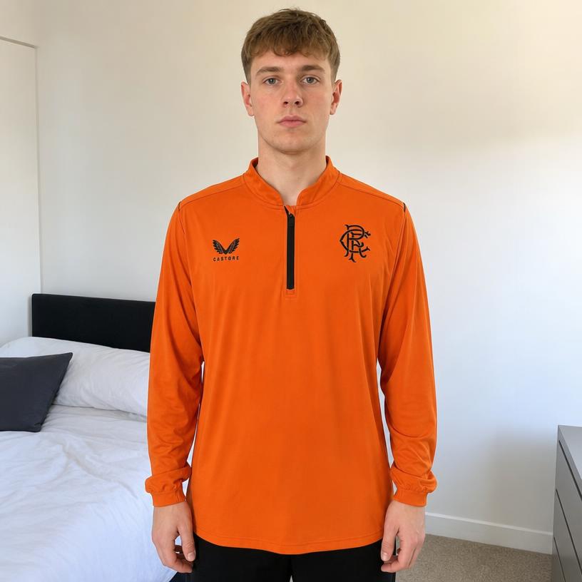 Castore Rangers FC orange quarter-zip training top