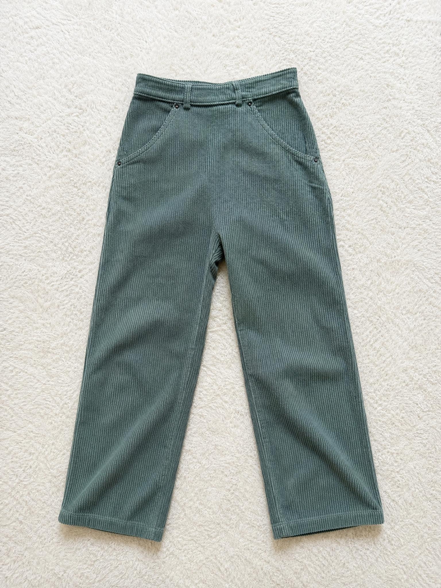 Dark teal corduroy trousers with rivet details