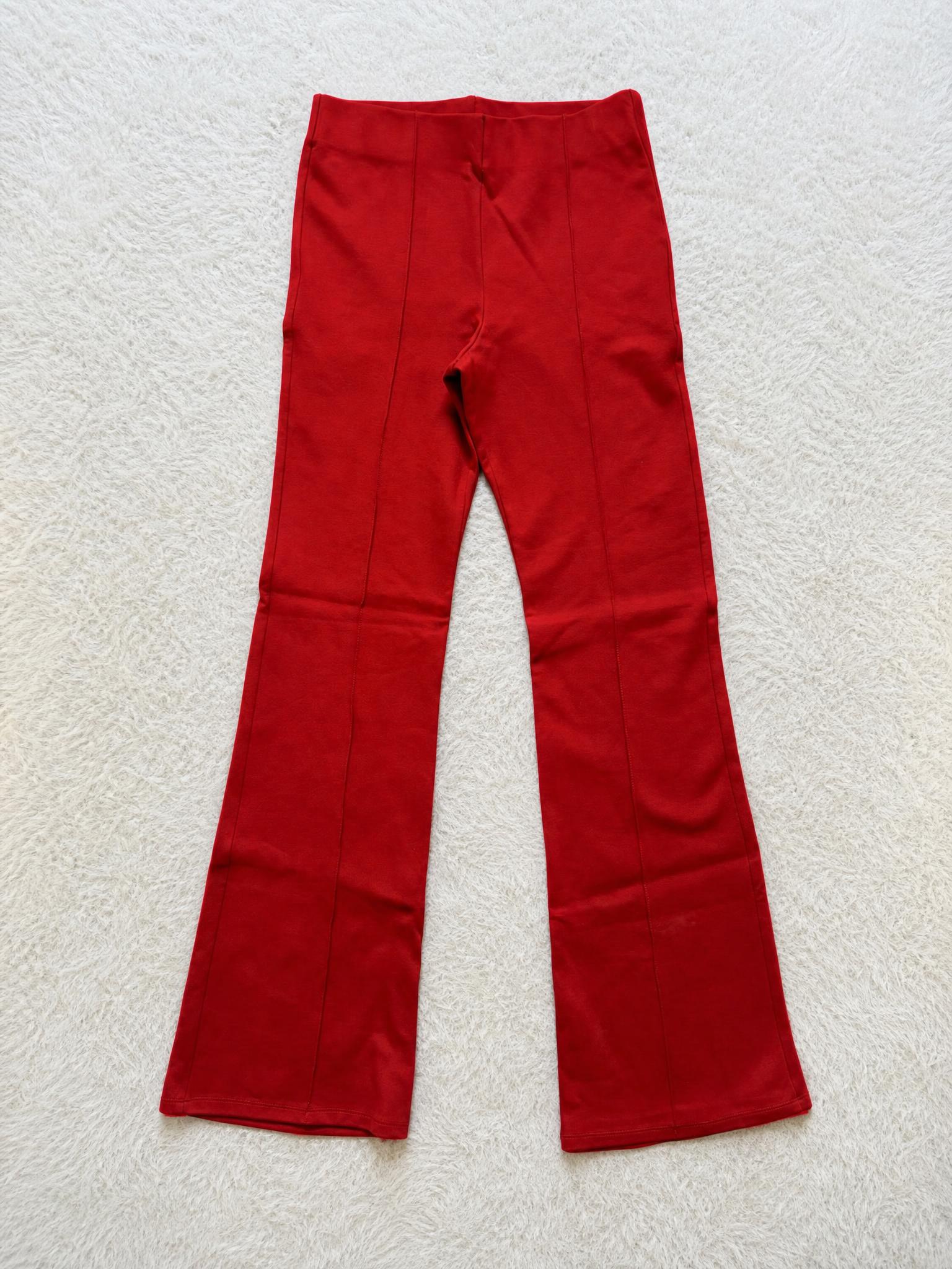 Red high-waisted wide-leg trousers with panel seams