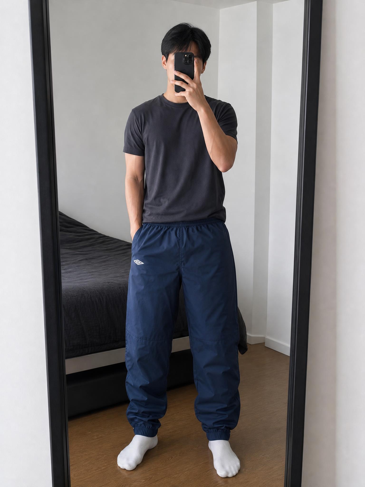 Umbro navy track trousers with cuffed ankles - very good