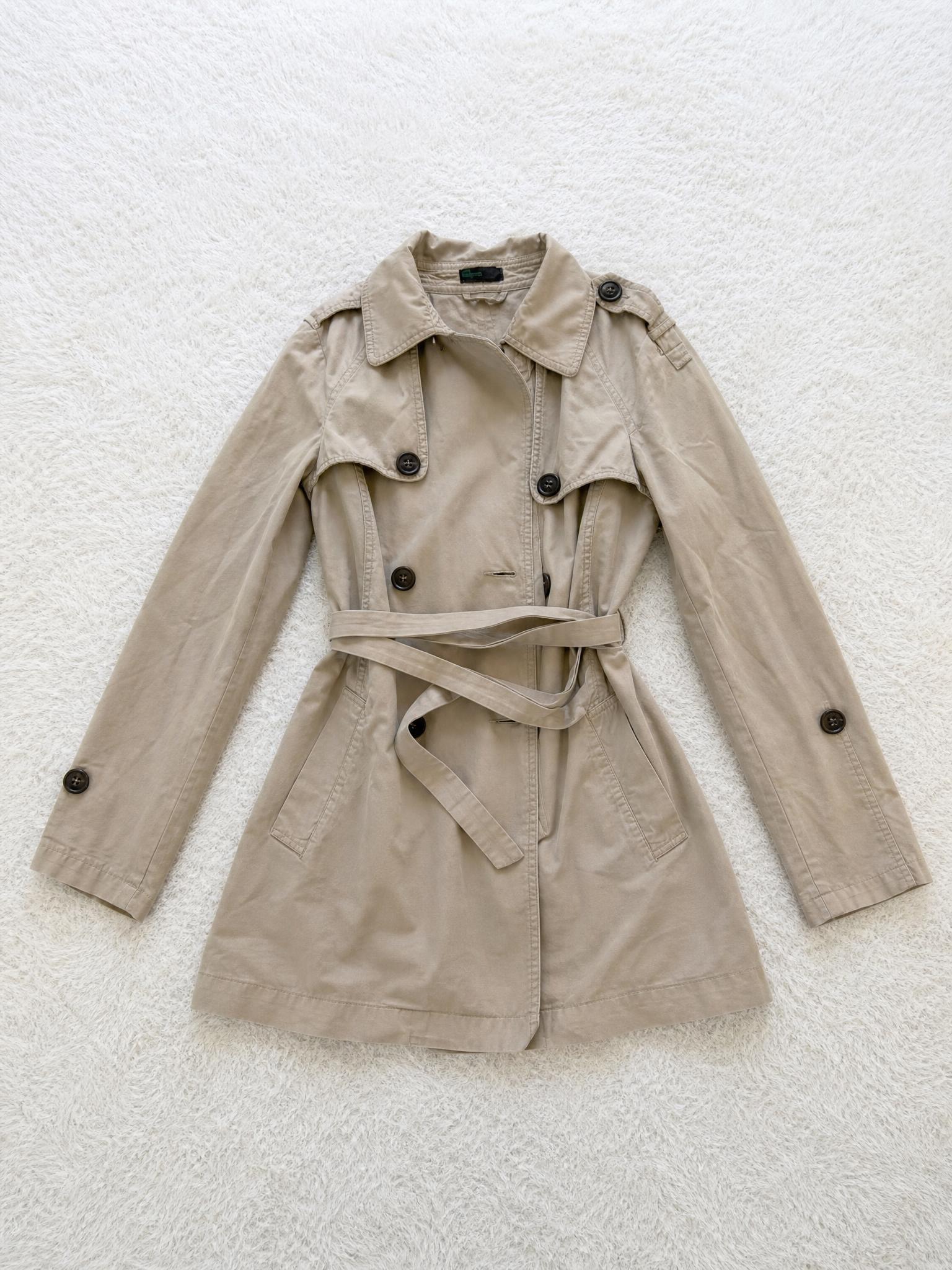 Beige belted trench coat with epaulettes