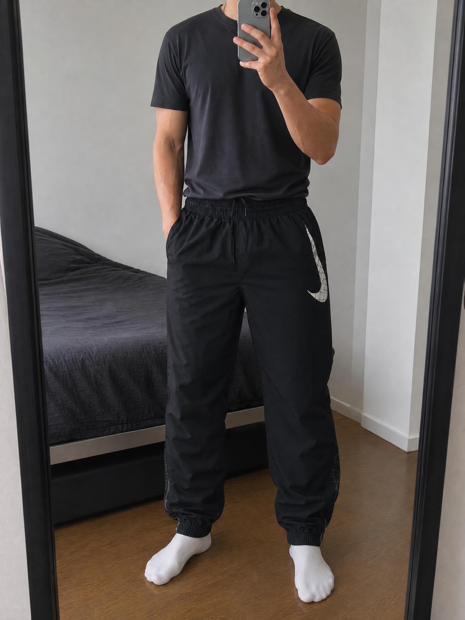 Nike Black Running Track Pants with Swoosh Graphic