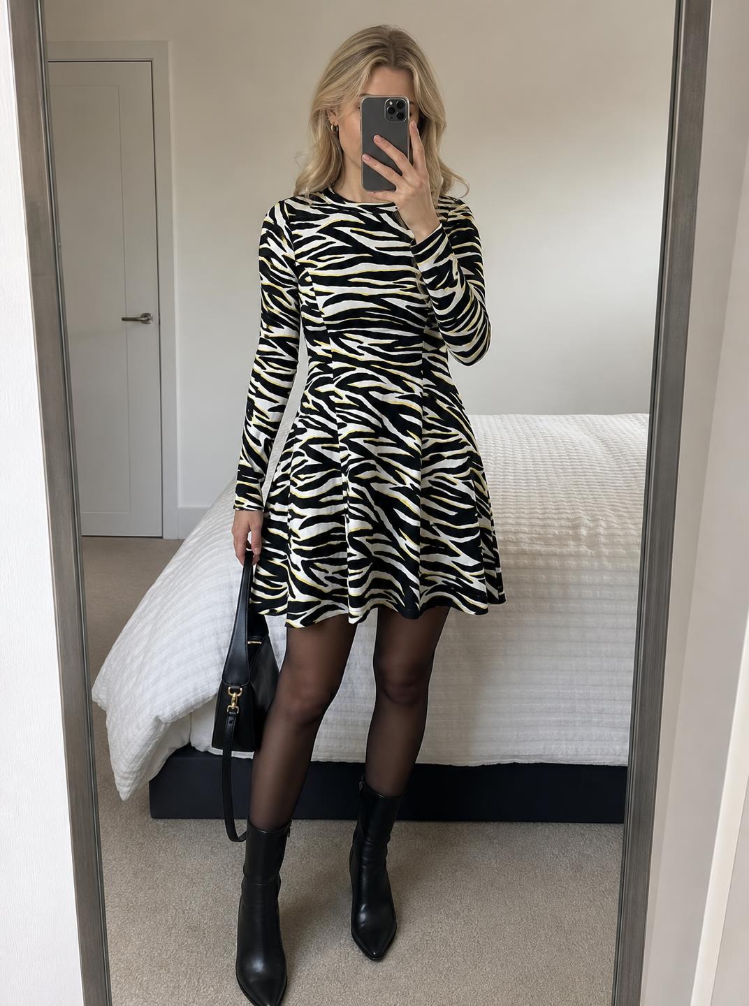 Zebra print long sleeve skater dress with yellow accents