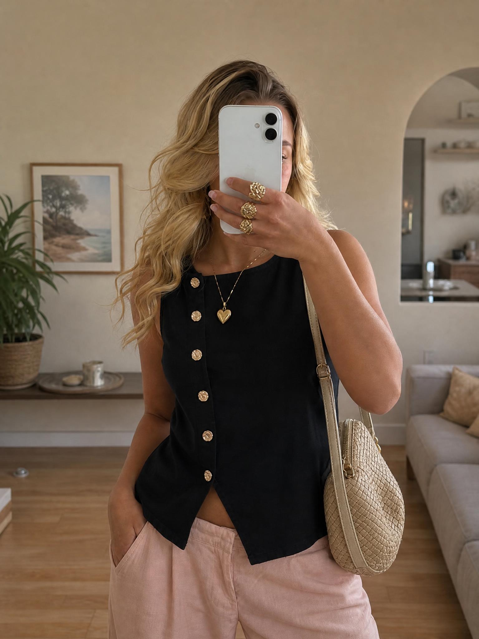 Black sleeveless playsuit with gold-tone buttons, UK 12