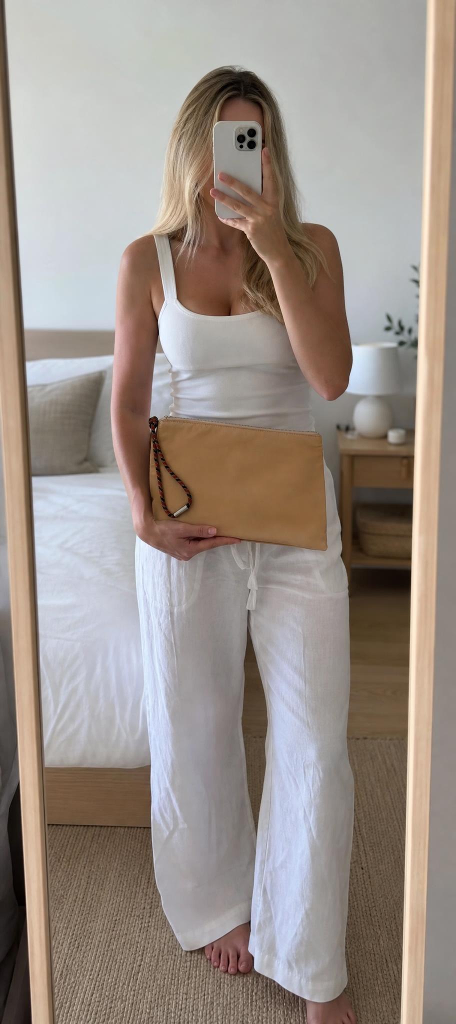 Adolfo Dominguez camel zip clutch with braided wrist strap
