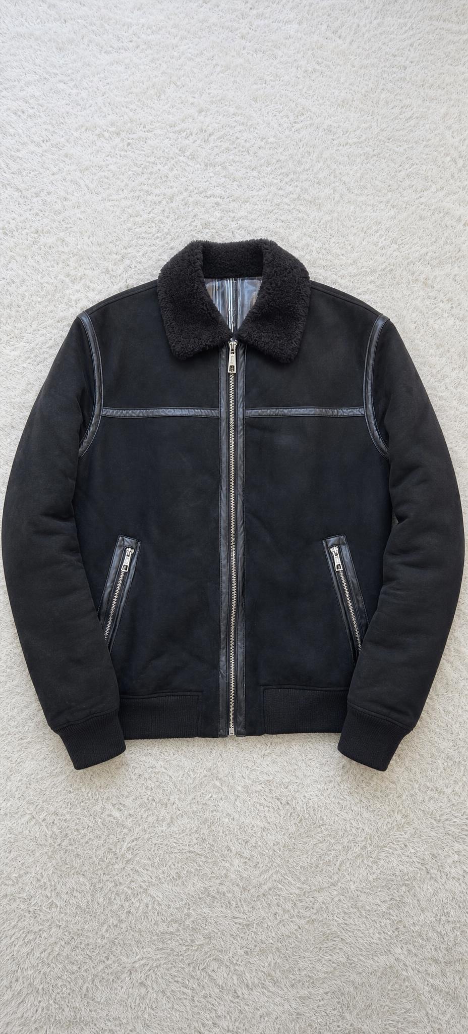 Black bomber jacket with shearling collar and zip pockets