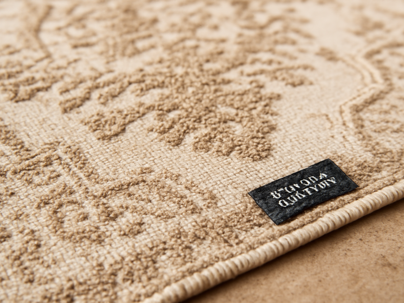 Macro detail of beige boho rug weave and low pile texture in close-up