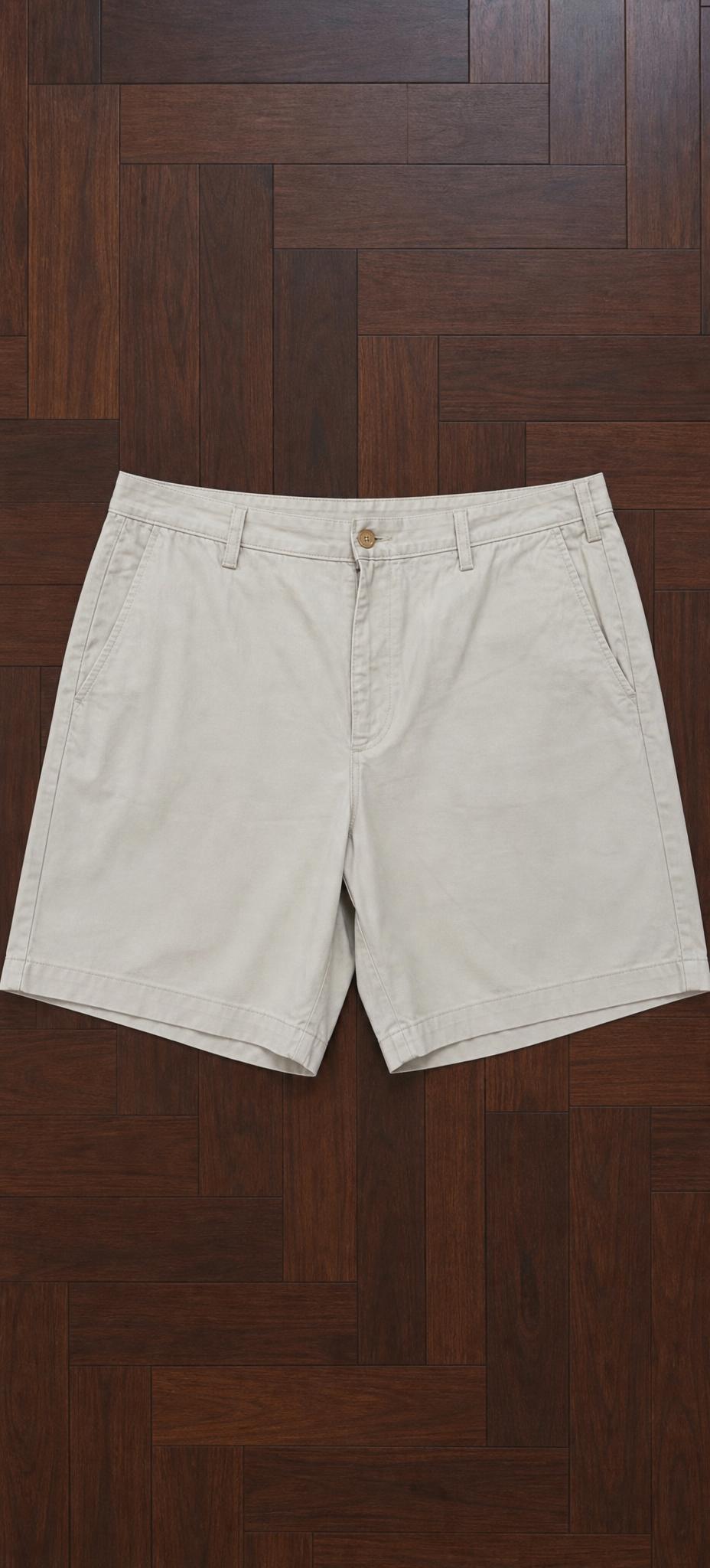 Ivory high-waisted tailored shorts with pockets