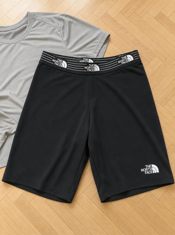 The North Face black fitted athletic shorts with logo waistband