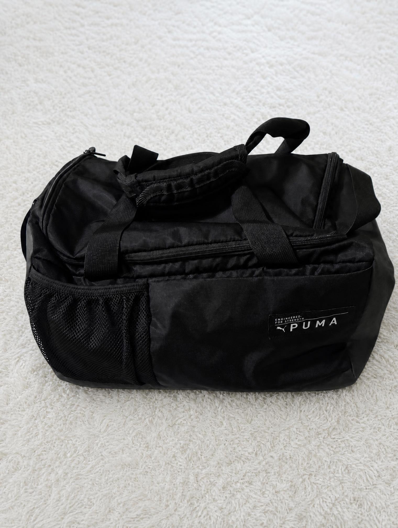 Puma black sports duffel gym bag with mesh pocket - very good