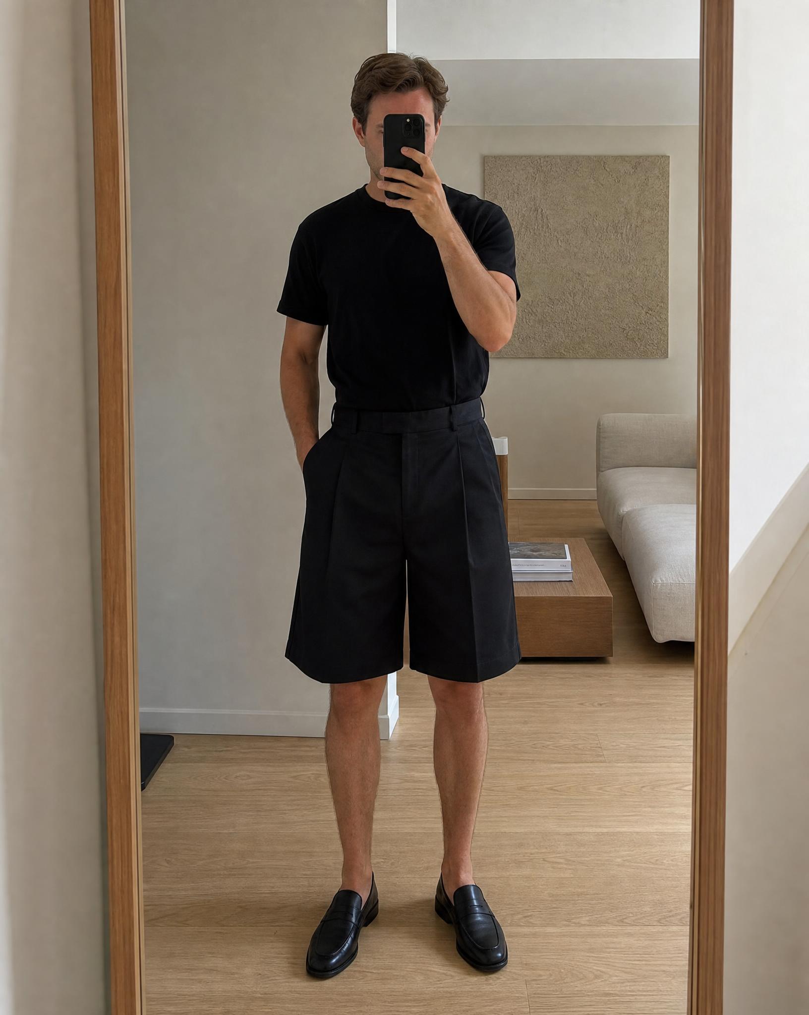 Black high-waisted tailored Bermuda shorts