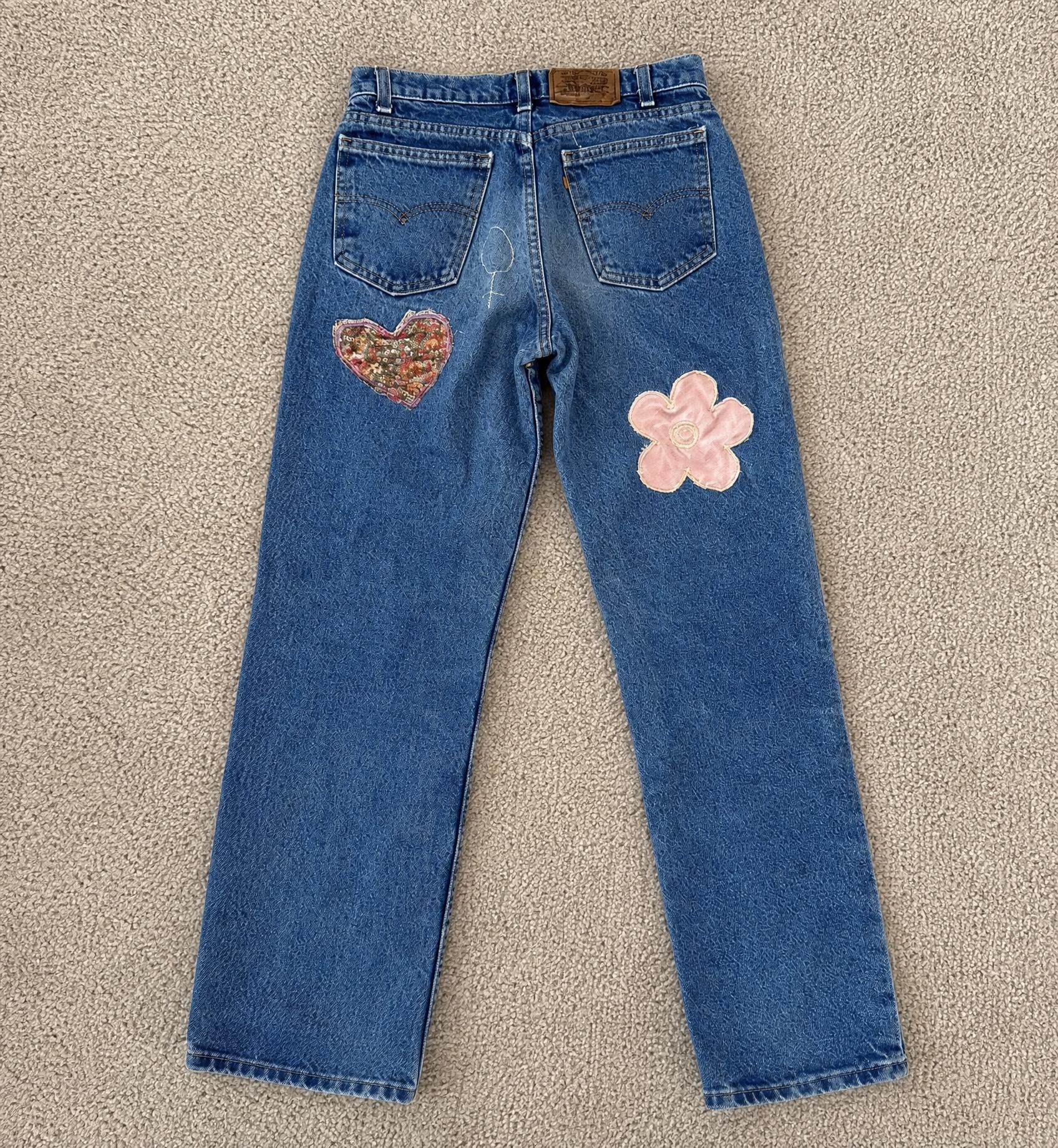 Kids blue denim jeans with floral heart and flower details