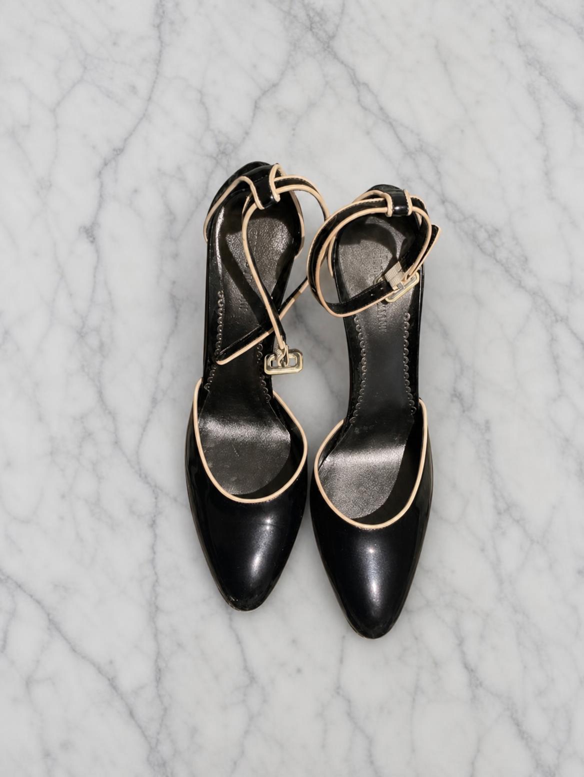Black pointed court heels with nude ankle straps