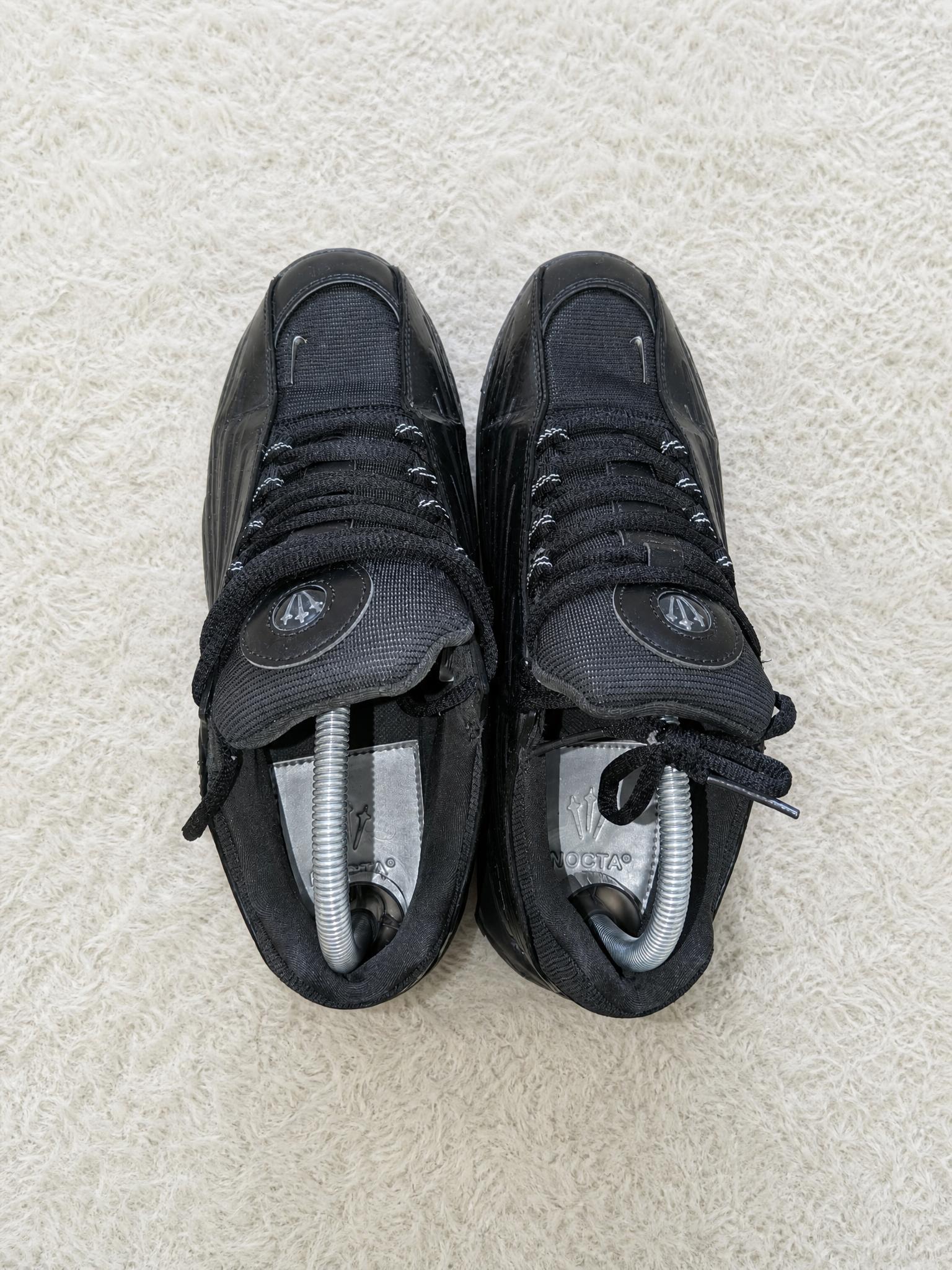 Nike NOCTA black chunky sneakers with silver details