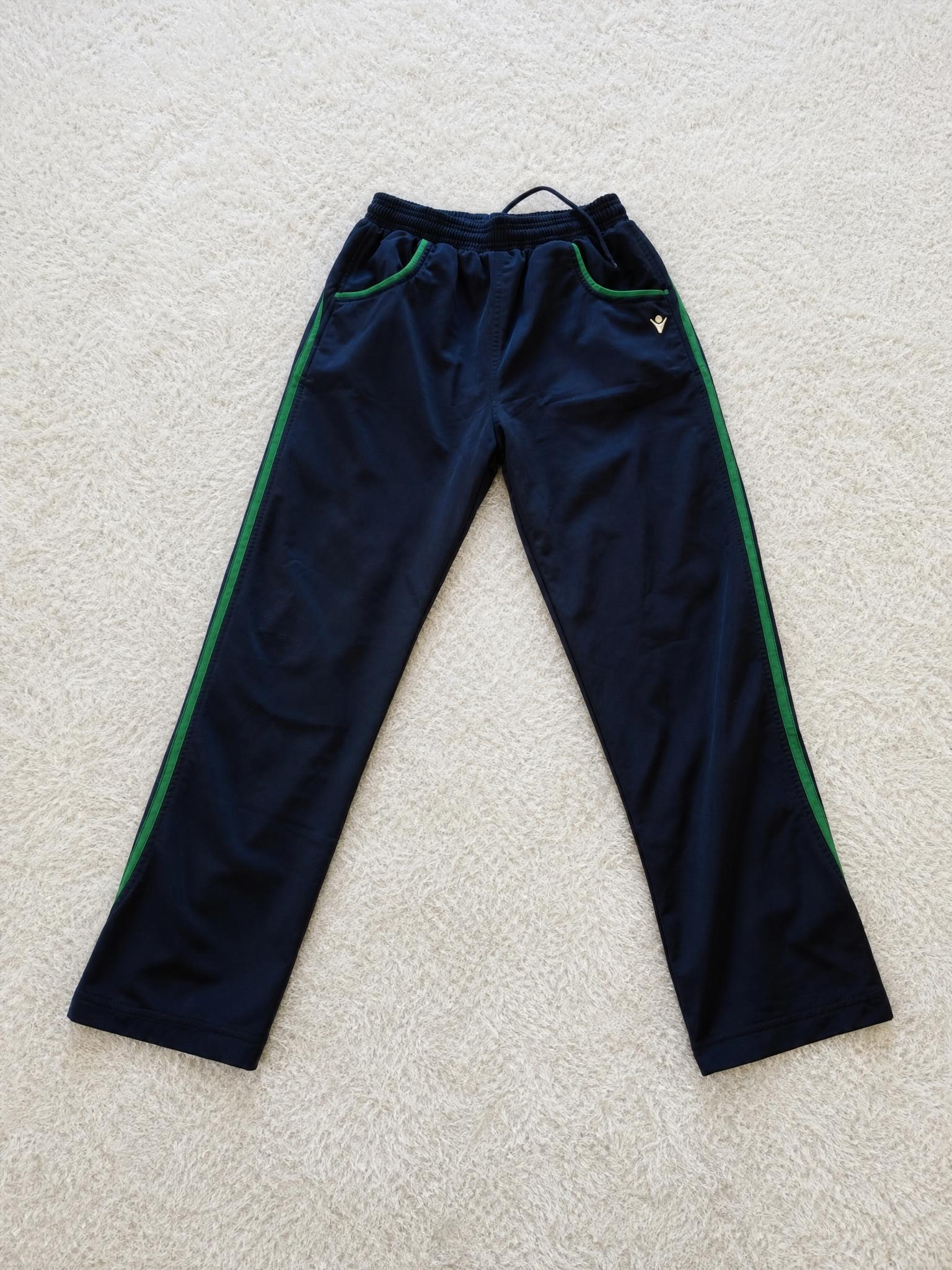 Navy blue track pants with green stripes – very good condition